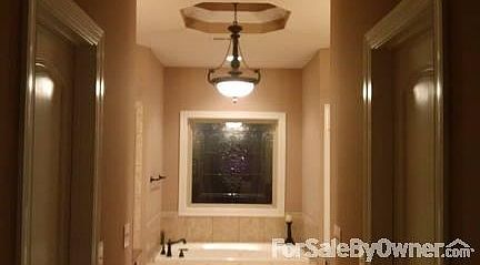 Master Bathroom
						:
						Ceramic tile with separate granite counter-top sinks, shower, jetted tub, toilet