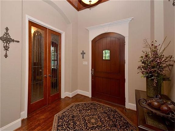Entry, study to your right.  Note the attention to detail throughout the home & beautiful trim on the ceiling.