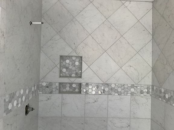 Tiled master bathroom 