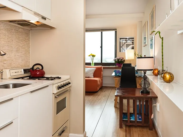 Galley kitchen with full-size fridge