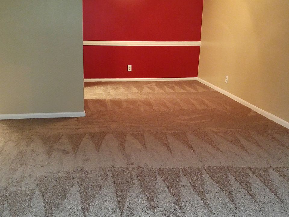 Spacious living and dining room with accent wall -- you choo