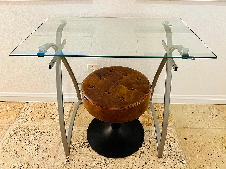 Table and swivel, adjustable stool can be for makeup or a laptop