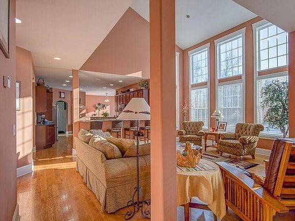 Wall of windows in the open family room kitchen