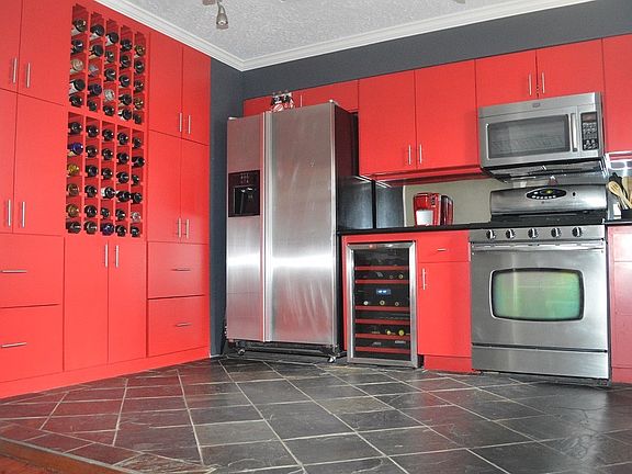 Kitchen featuring Stainless Appliances and Granite Counter T