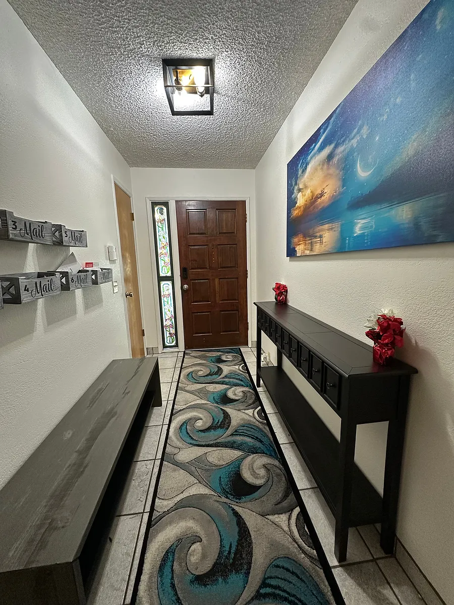 Back is to the living room to the left is the dinning/kitchen/Laundry room - Clemo Ave