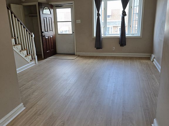 Living room with new hardwood floor just installed