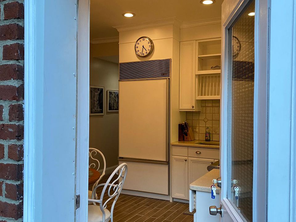 At doorway to Apt 1