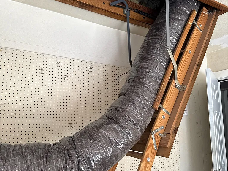 REMODEL: Foaming of attic! Garage has overhead storage accessed by pull down stairs