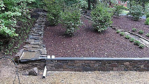 Right before the work is finished on the new hillside garden.
