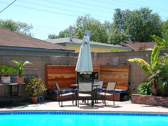 Custom Outdoor Wood Burning Fireplace