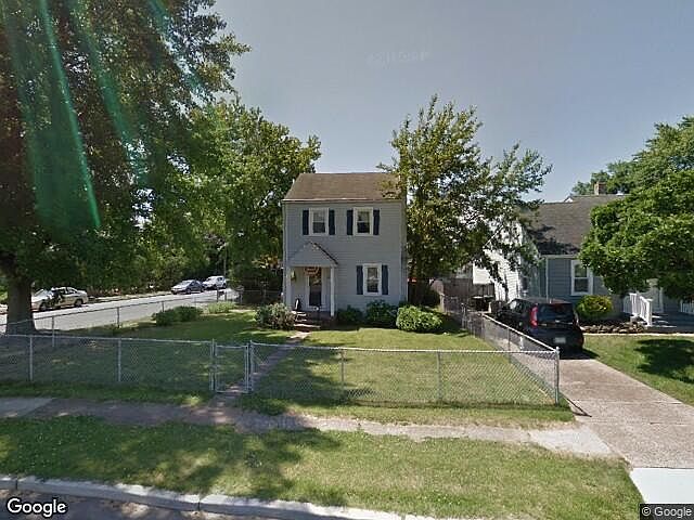 Front exterior with fenced in yard
