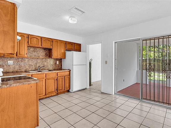 5th image of 5441-5445 NW 17th Ct