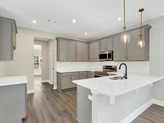 Oscar Mulberry Kitchen with Island - Ernest Homes