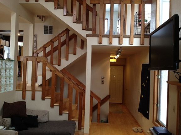 Stairwell & Entrance from library & living room