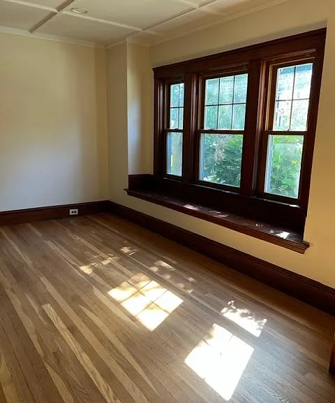 Living room has window seat