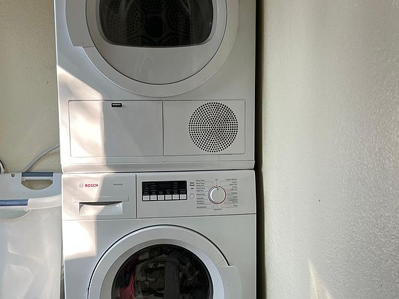 New washer/dryer in laundry room.