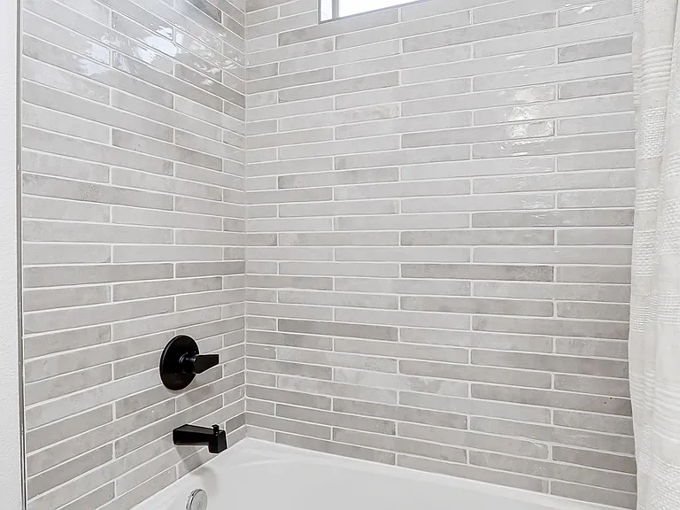 With a comfortable bathtub for after a long day!