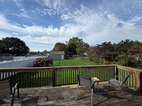 Enjoy your morning coffee or unwind after work on the spacious back deck overlooking the yard.
