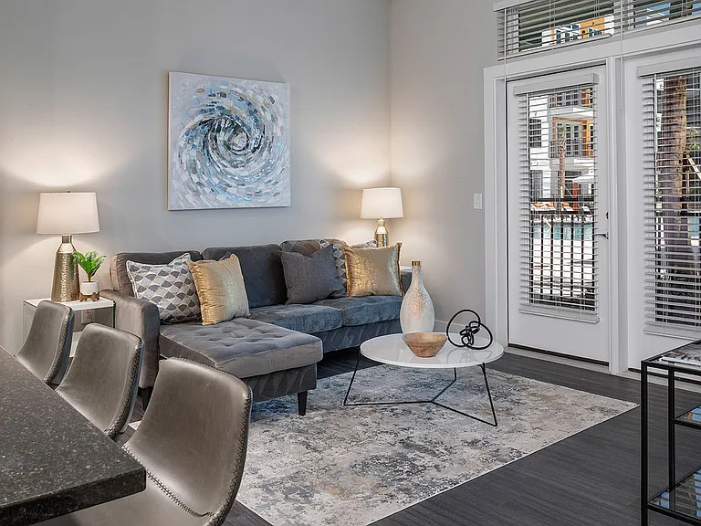 Experience the charm of this elegantly designed living room, combining style and comfort.