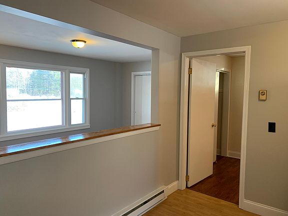 View from kitchen towards LR and Bedroom door