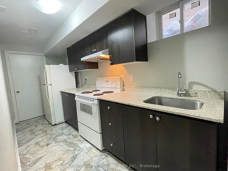 7372 Saint Barbara Blvd #BASEMENT — Photo 11