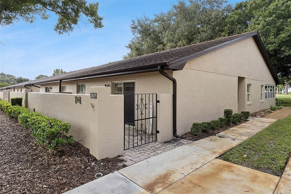2825 WINGFOOT COURT — Cypresswood Golf & Country Club