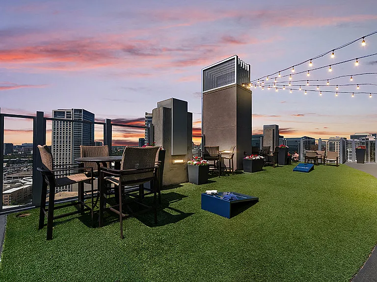 Enjoy a game of cornhole on the SkyDeck rooftop