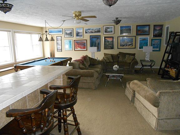 Game room with custom tile bar