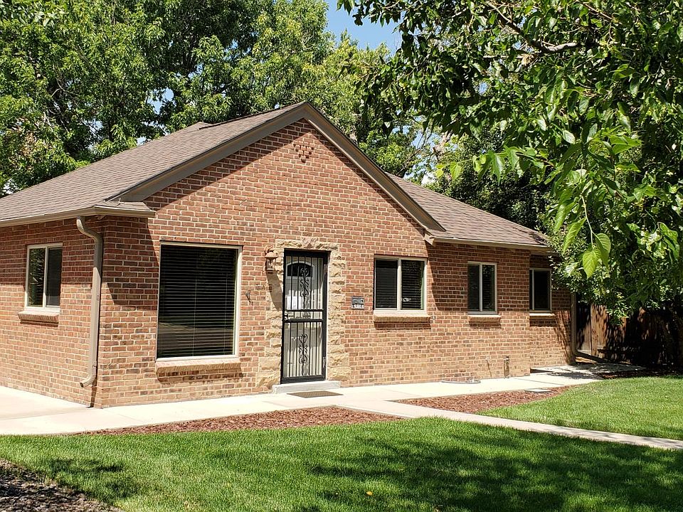 Charming Tudor home just steps from restaurants on 22nd and Oneida.