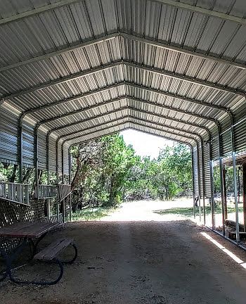 RV port at back of barn
