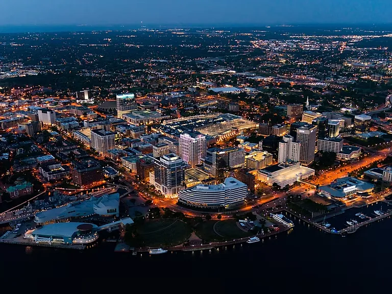MacArthur Center : Whether you need a quick wardrobe update or a rainy-day movie, this massive shopping hub is just a 12-minute drive away, making errands effortless during your stay.