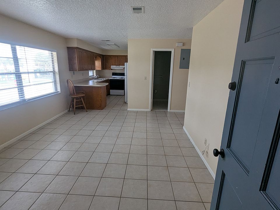 View from front door entrance shows large living room