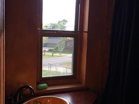 View of lake from front & back of house