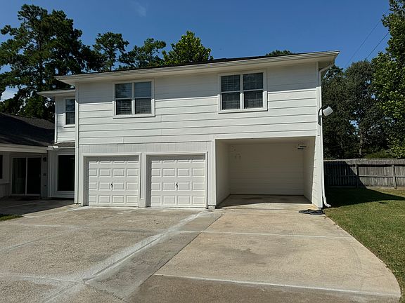 TWO CAR GARAGE AND CARPORT