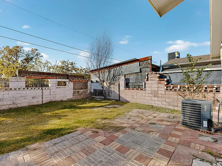 Fenced backyard featuring a patio area