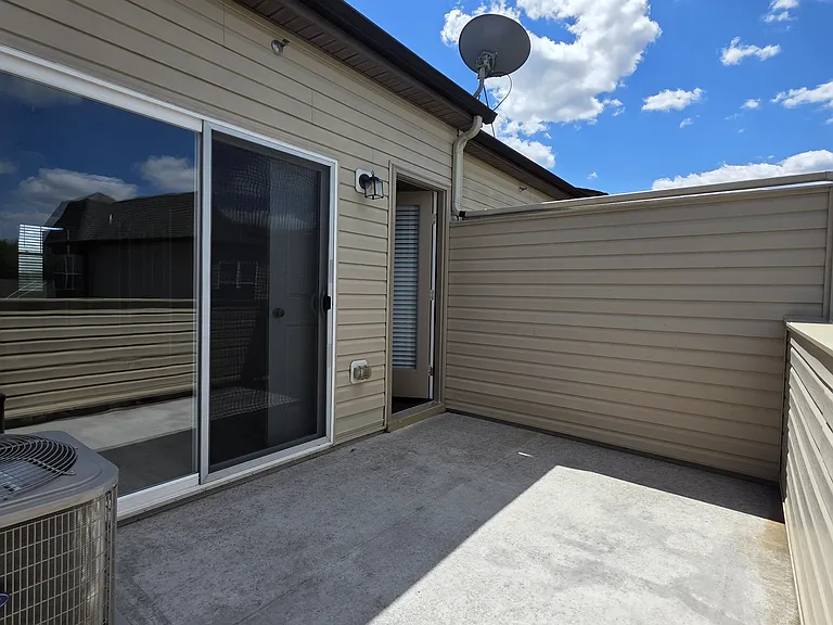 Owner's suite/top floor balcony with separate entryways