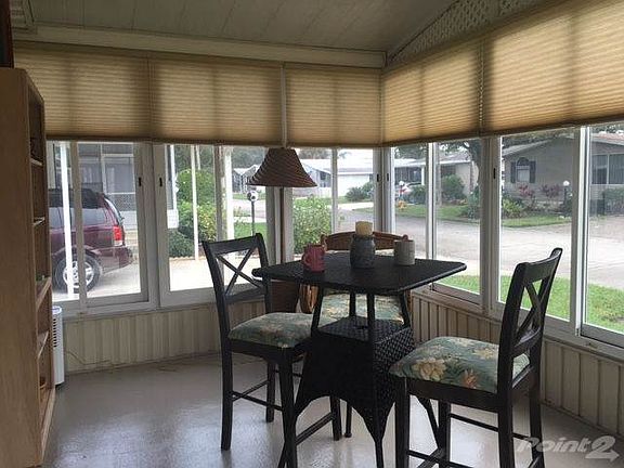 Enclosed sunporch with sliding glass windows