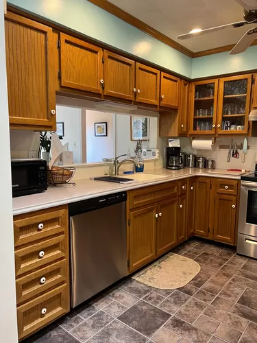 Kitchen houses all modern appliances including dishwasher, microwave, air fryer, mixer, toaster oven, blender, coffee pot & more - 44 Overlook Rd