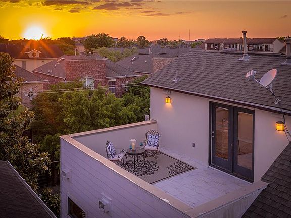 Imagine relaxing on this roof-top deck watching the sunset!