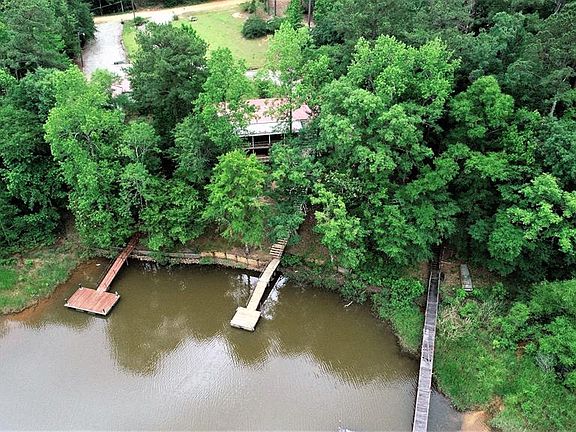 Image 2: Aerial of Back of Home From The Lake