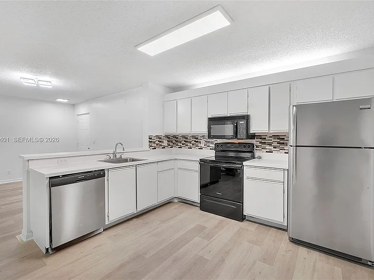 5661 Riverside Dr #103B7 — Photo 1