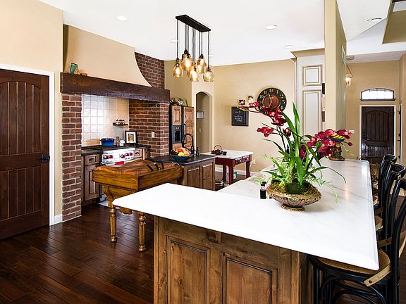 Kitchen with brick hearth