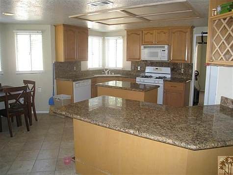 Solid granite counters in kitchen & bathrooms!