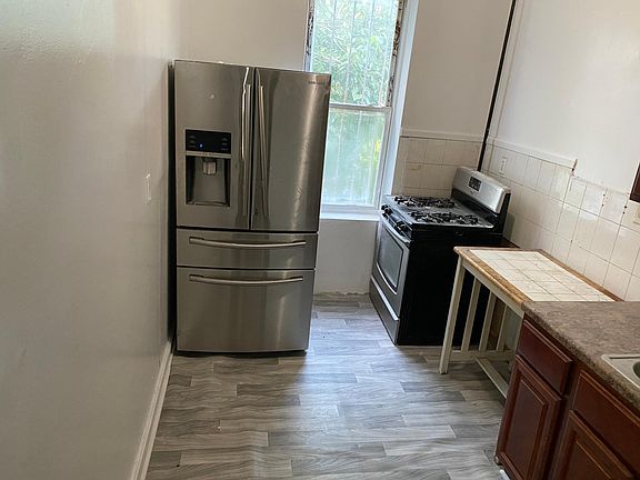 3rd image of 10609 Guy R Brewer Blvd Floor 2