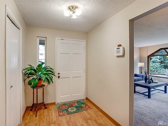 You'll find laminate flooring in this sunny entry.