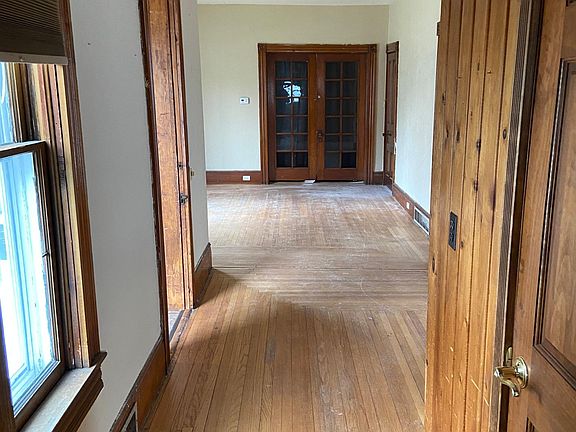 Hall from the kitchen bathroom door on the right in picture