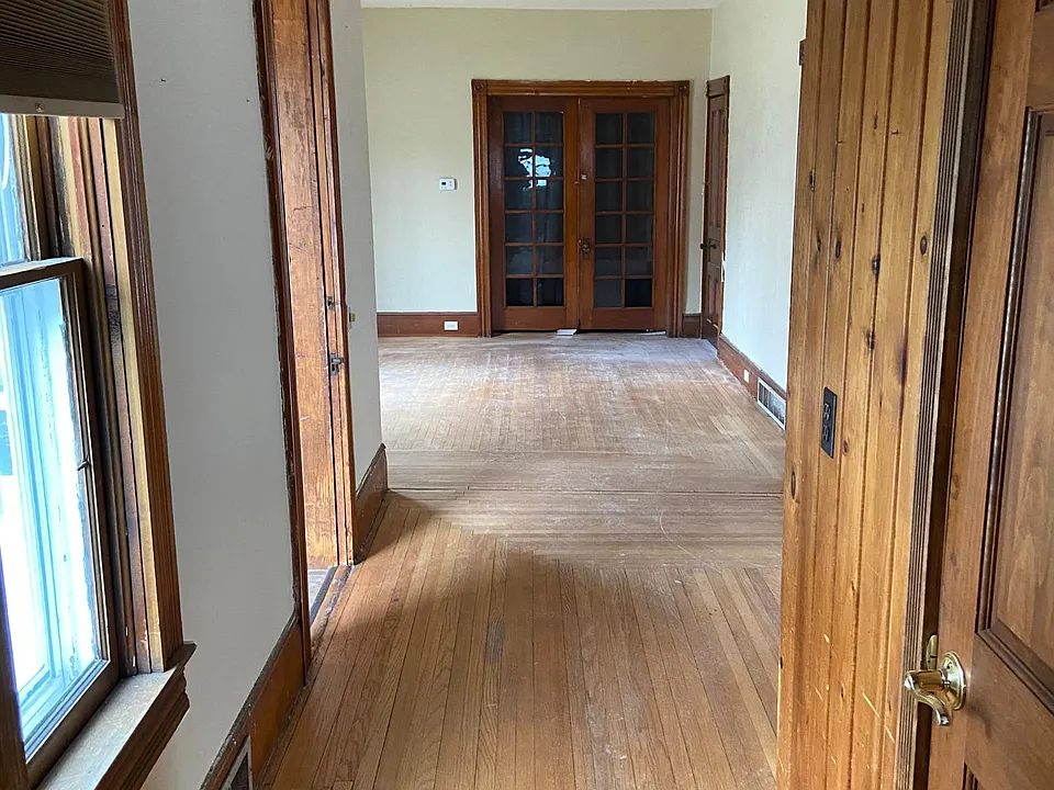 Hall from the kitchen bathroom door on the right in picture