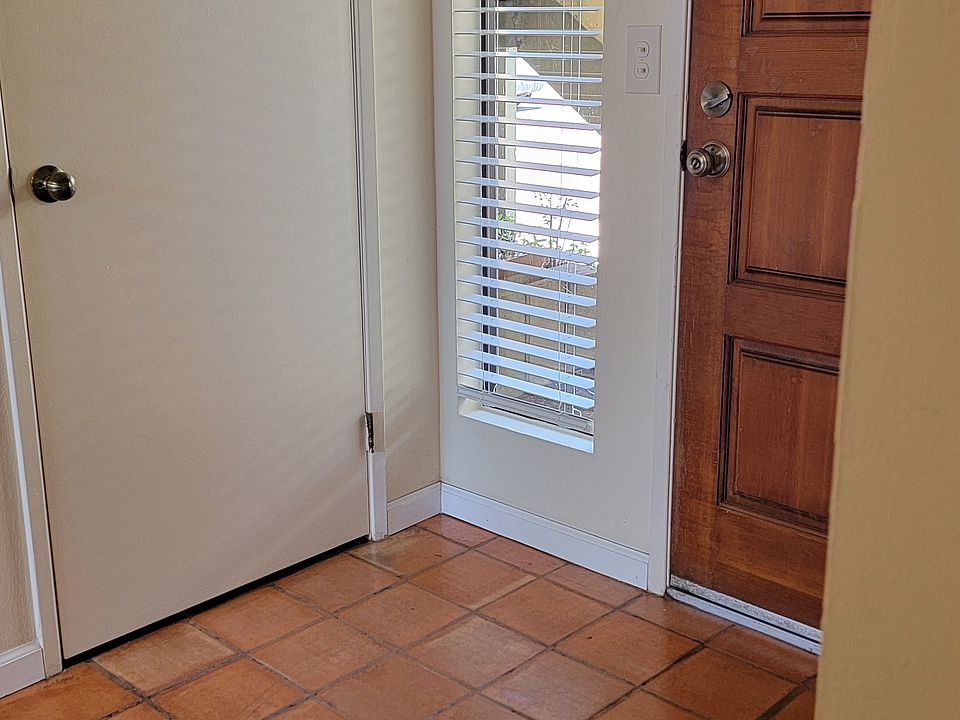 Unit F Entry area with coat closet for storage