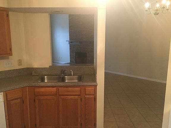Kitchen open to living room and dining room