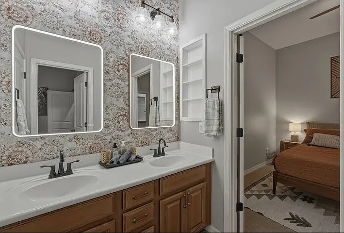 Freshen up at your leisure in a guest bedroom with king bed and shared Jack and Jill bath.